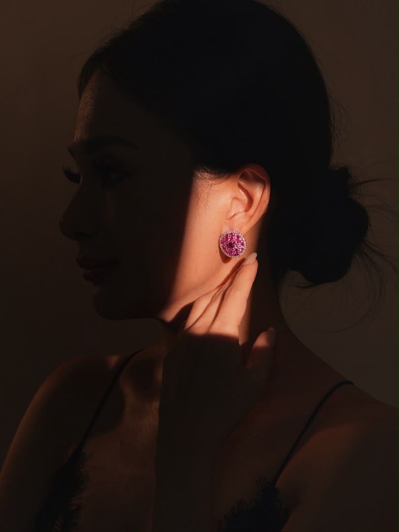 Ruby Radiance stud earrings worn, close-up